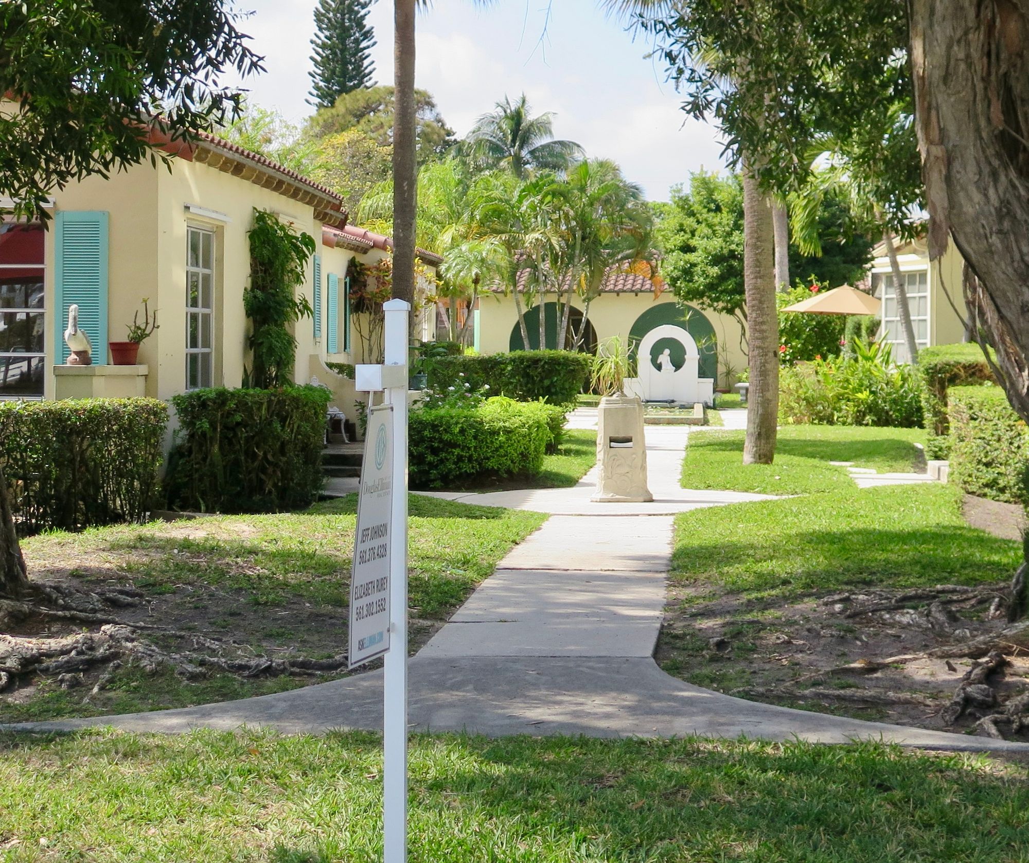 The Garage Door Invasion Eroding the Historic Village Feel in Delray Beach