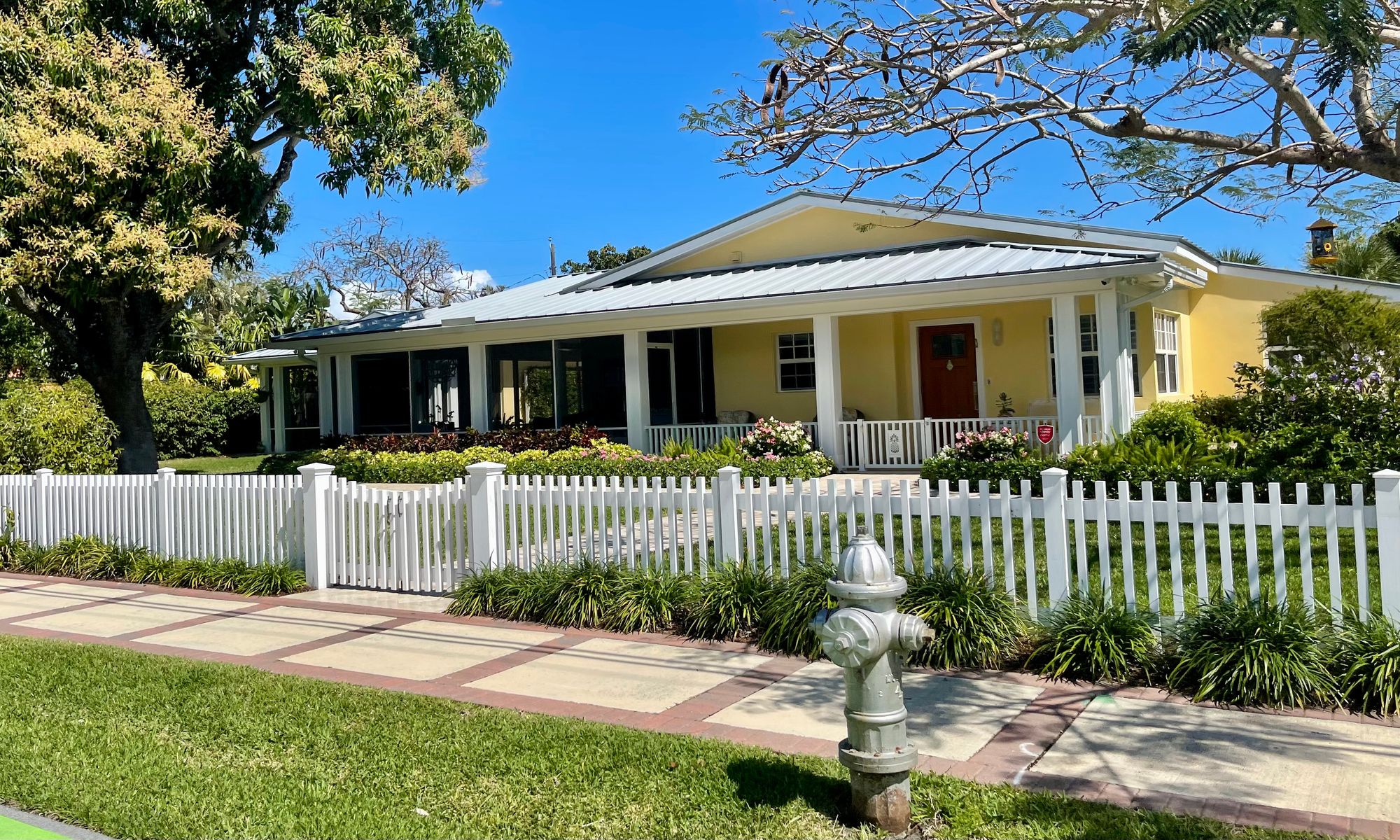 The Garage Door Invasion Eroding the Historic Village Feel in Delray Beach