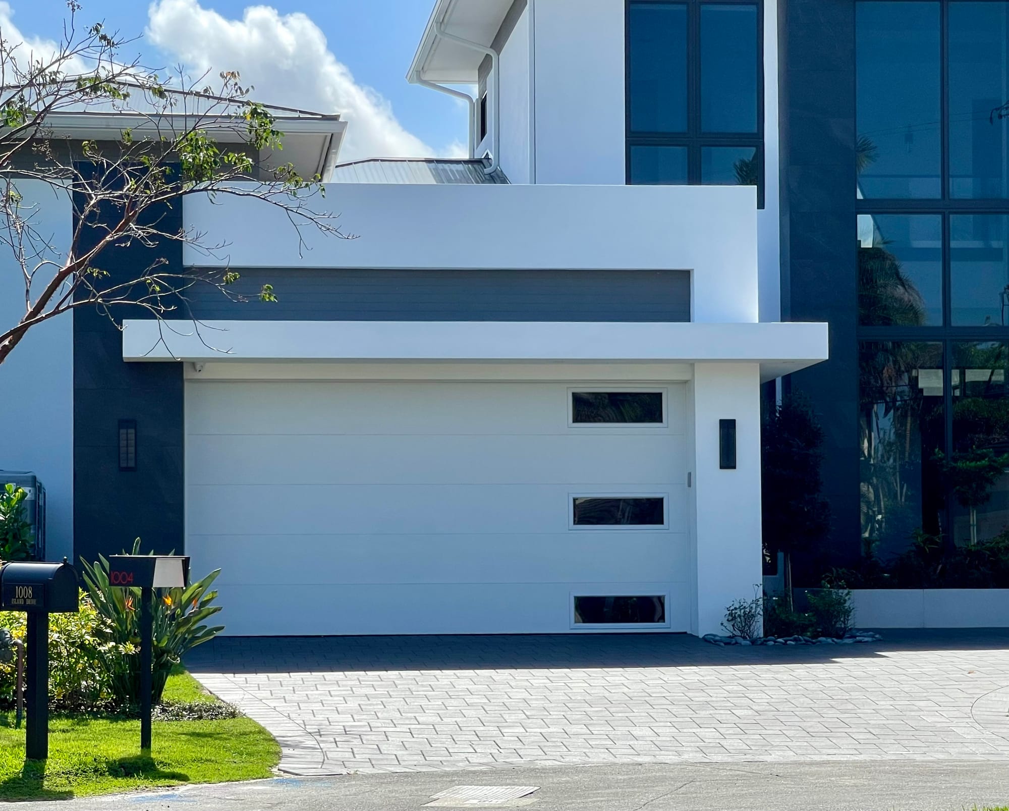 The Garage Door Invasion Eroding the Historic Village Feel in Delray Beach