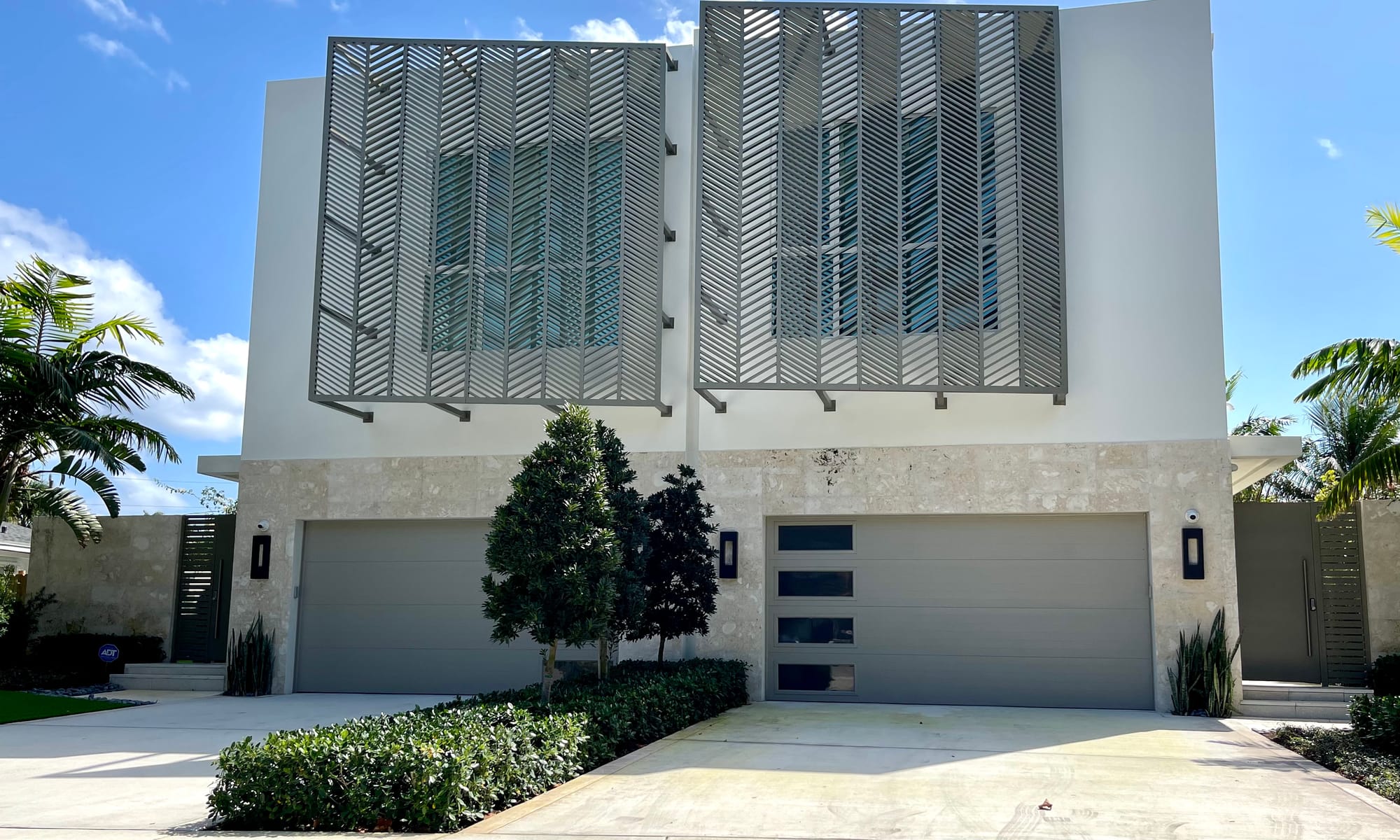 The Garage Door Invasion Eroding the Historic Village Feel in Delray Beach