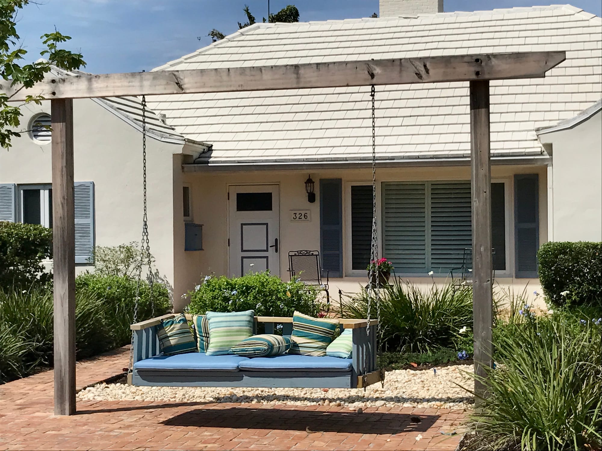 The Garage Door Invasion Eroding the Historic Village Feel in Delray Beach